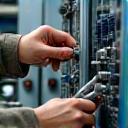 Technician performing routine maintenance